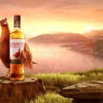 The one and only Famous Grouse holding his scotch
