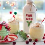 Egg Nog Bottle Near Cupcake, Red Berry Fruits, and Ice Cold Drinks